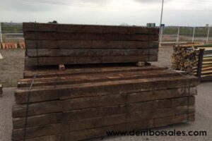 vigas de madera recuperadas de tren